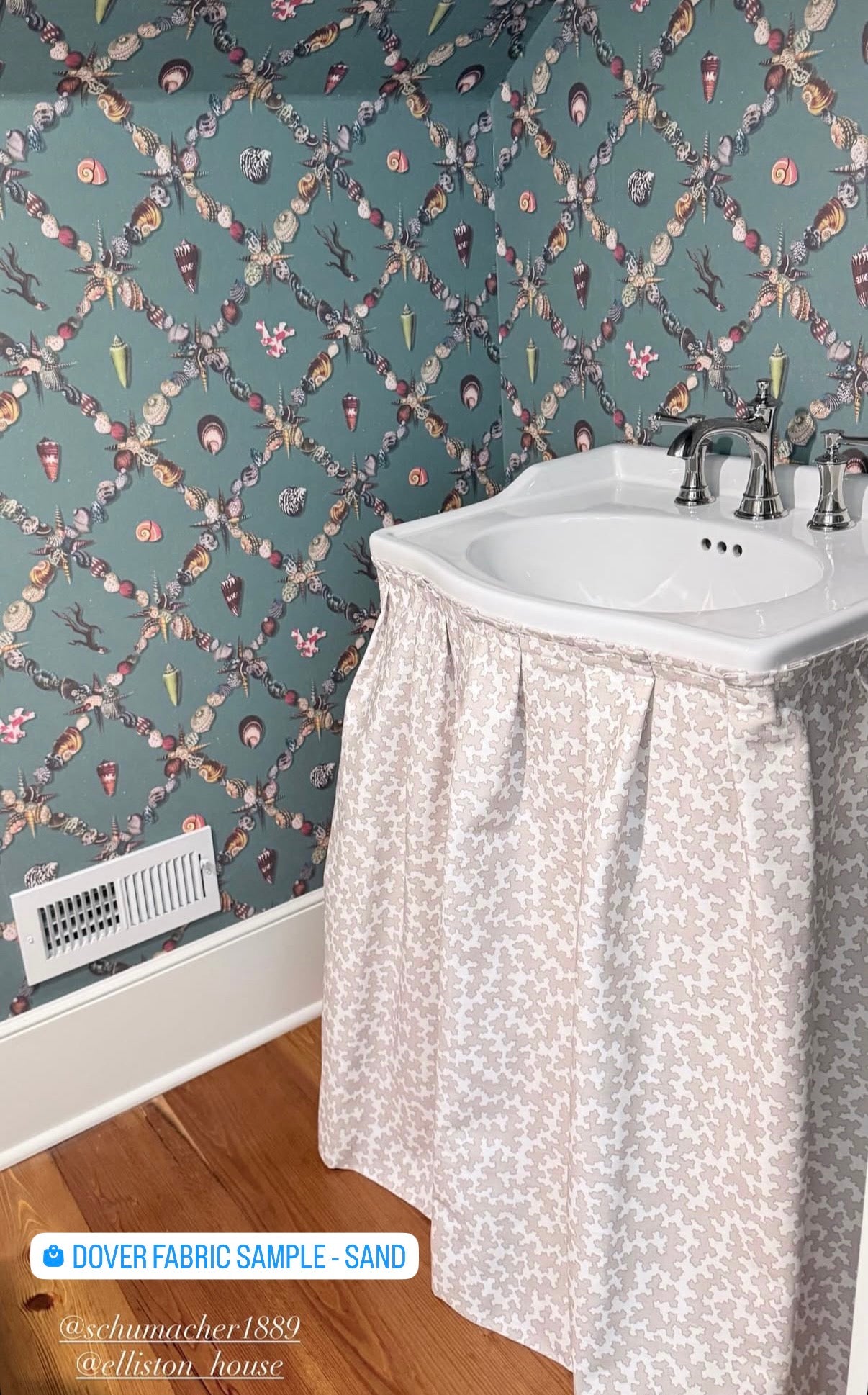 Dover Fabric in Sand, a linen-cotton blend with a subtle coral pattern, draped over a white pedestal sink.