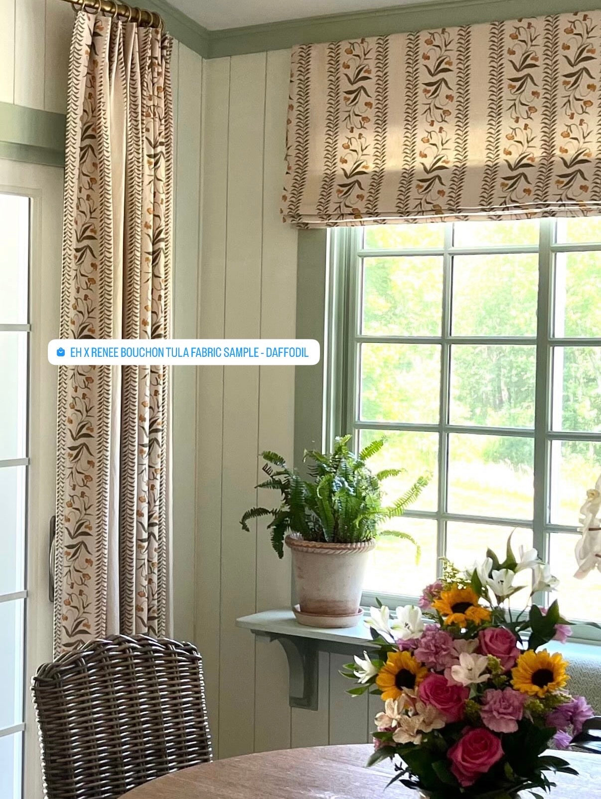 EH x Renee Bouchon Tula Fabric in Daffodil, a linen fabric with a floral and striped pattern, used as curtains and a roman shade.