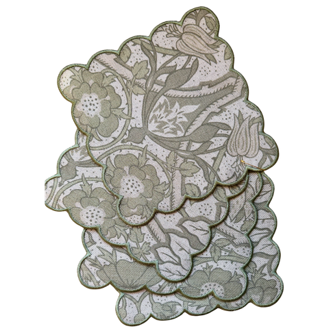 Set of 4 Flora Verbena scalloped linen cocktail napkins with green floral print and contrasting green trim.