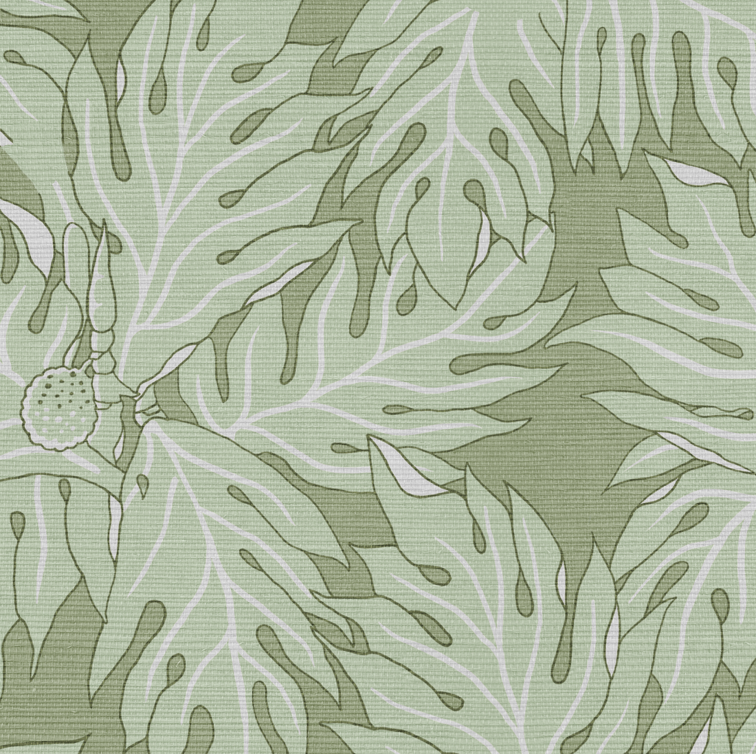 Green grasscloth wallcovering with a repeating breadfruit leaf pattern in light green and white.