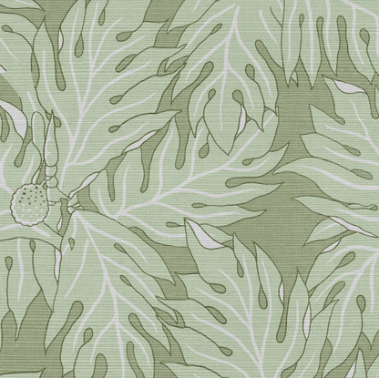 Green grasscloth wallcovering with a repeating breadfruit leaf pattern in light green and white.