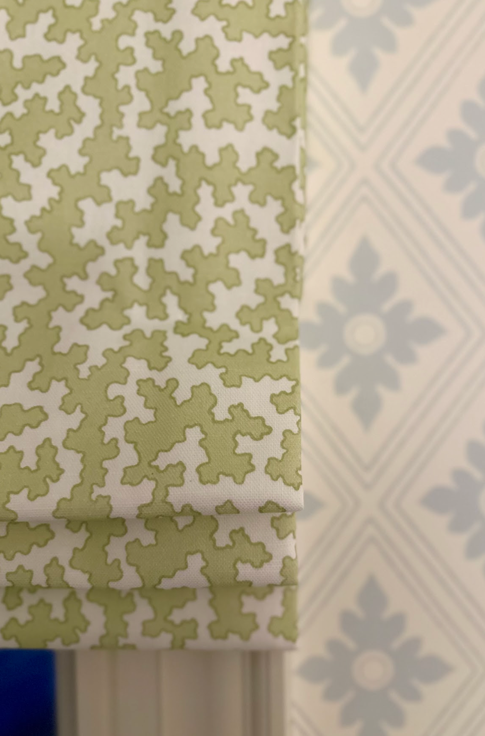 Dover Fabric in Apple, a green and white linen-cotton blend with a geometric pattern.