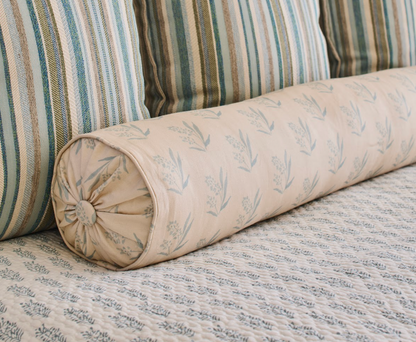 EH x Renee Bouchon Marbella Sea linen fabric on a bolster pillow with botanical print.