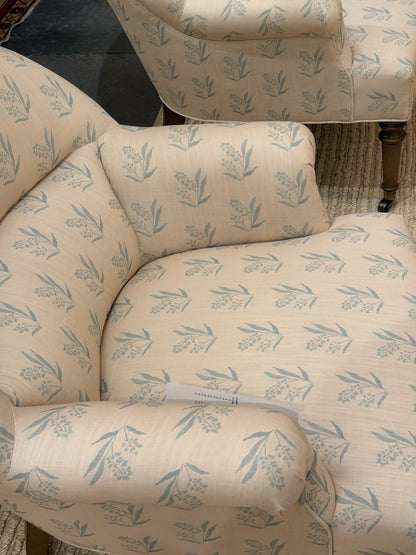 EH x Renee Bouchon Marbella Sea linen fabric with light blue botanical pattern on an armchair.
