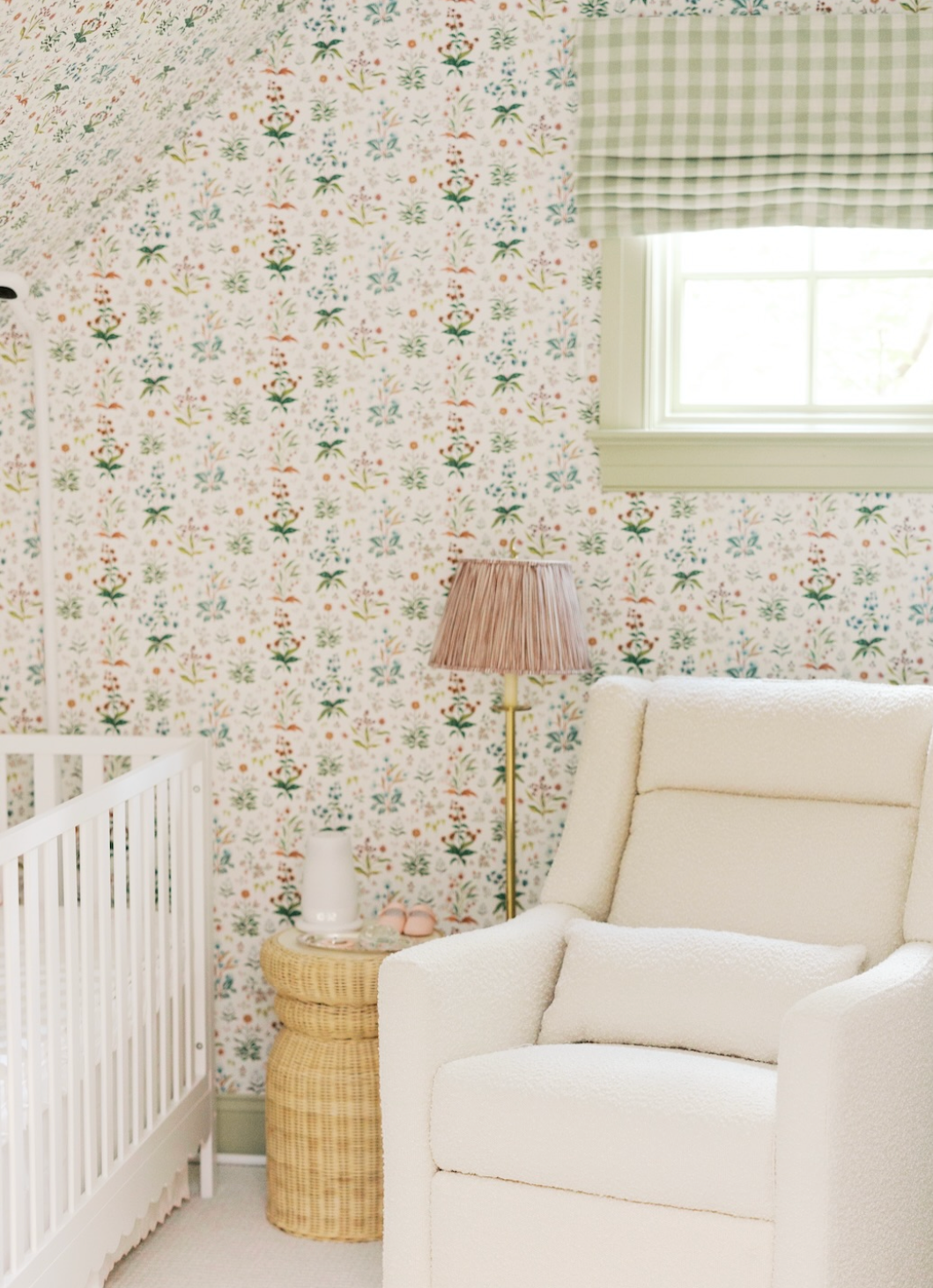White Meadow Multi clay coated wallpaper with a delicate floral pattern covering walls and ceiling in a nursery.