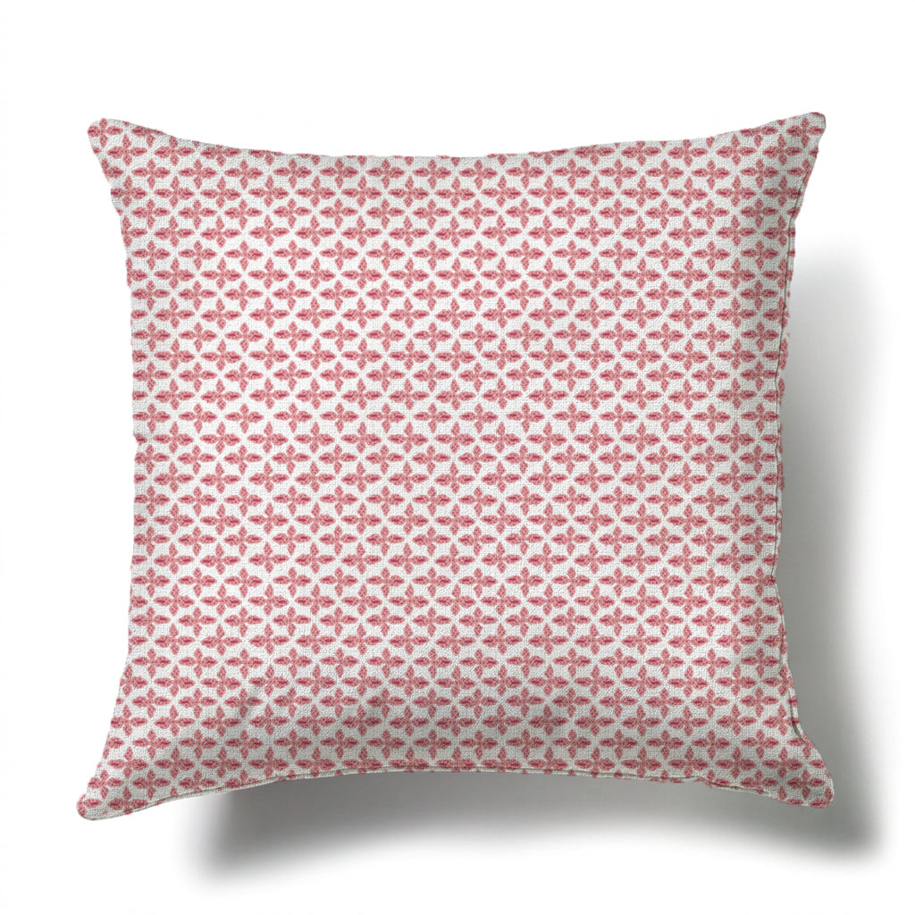 Posey Pillow - Berry: Square linen-cotton blend pillow with a repeating berry-colored geometric floral pattern.