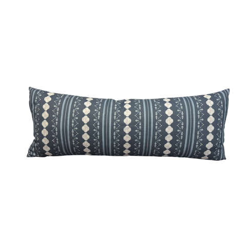 Stratford Denim Lumbar 36x14 Pillow with a blue and white striped, floral, and geometric pattern.